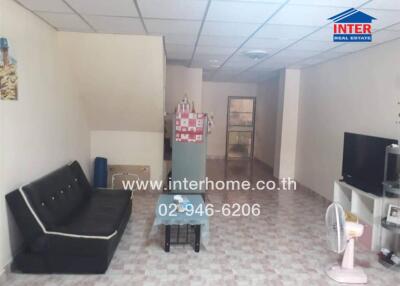 living room with furniture and tiled floor