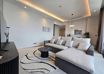 Spacious and modern living room with a large sectional sofa and contemporary decor
