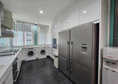 Modern kitchen with appliances and sleek finishes