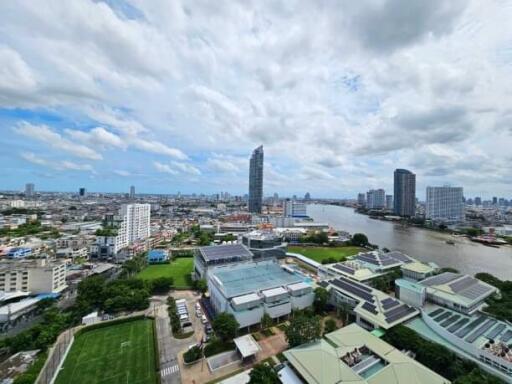 High-rise buildings with river and cityscape view