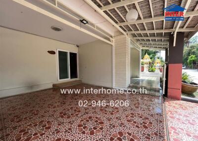 Covered outdoor area with tiled floor