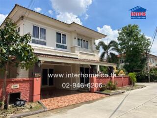 Two-story house with front yard and driveway