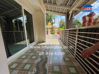 Spacious balcony or terrace area with garden view