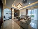 Spacious modern living room with elegant furnishings and lighting