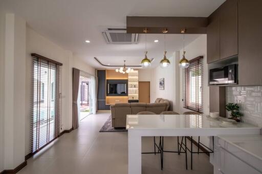 Modern open-plan living area with kitchen and lounge