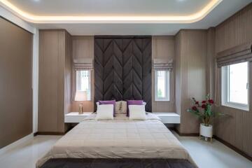 Spacious modern bedroom with a large bed
