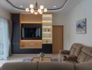 Modern living room with TV unit and chandelier