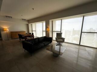 Modern living room with large windows