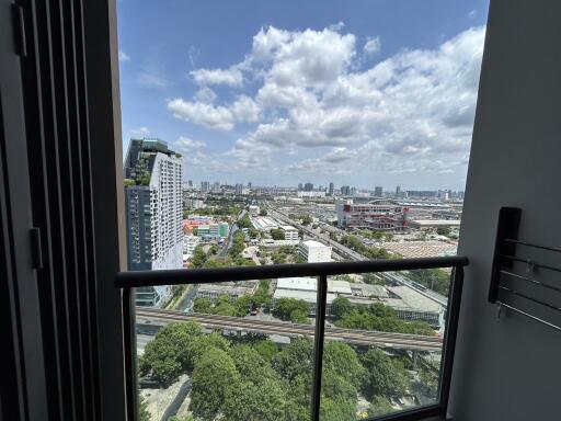 View from balcony showing cityscape and skyline