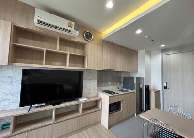 Modern kitchen with open shelving and built-in appliances
