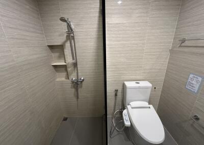 Modern bathroom with a shower and a toilet
