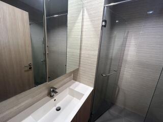 Modern bathroom with glass shower enclosure