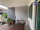 Outdoor balcony with plants and bicycles