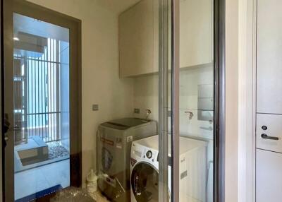 Laundry room with washer and dryer