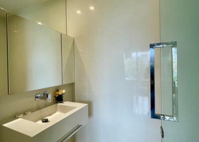 Modern bathroom with floating vanity and large mirror