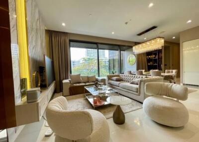 Elegant and modern living room with stylish furniture and large windows