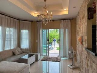 Bright living room with chandelier