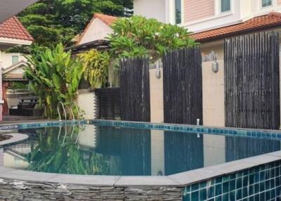 Outdoor swimming pool area in a residential property