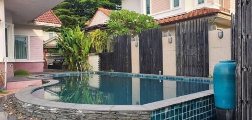 Outdoor swimming pool area in a residential property