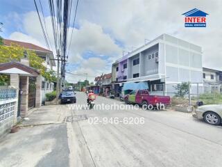 Street view of residential area with multi-story houses