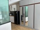 Modern kitchen with integrated appliances and built-in cabinets