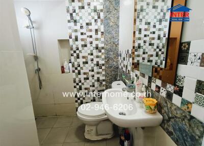 Bathroom with tile design and shower