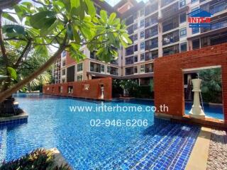 Outdoor pool area in a residential complex