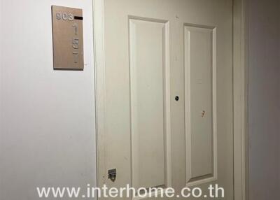 Apartment entrance door with unit number 903