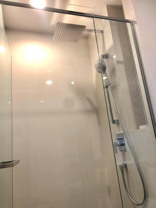 Modern shower area with glass doors