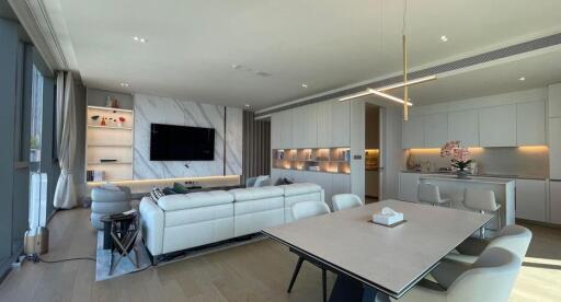 Modern living room with kitchen and dining area