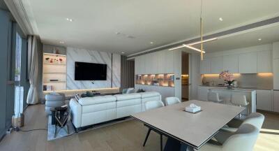 Spacious modern living room with integrated kitchen and dining area