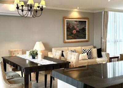 Elegant living room and dining area with modern decor