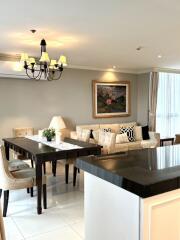 Elegant living room and dining area with modern decor