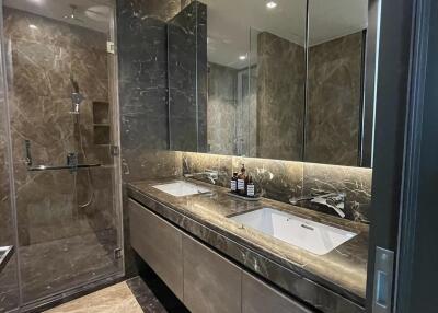 Modern bathroom with double sinks and large mirror