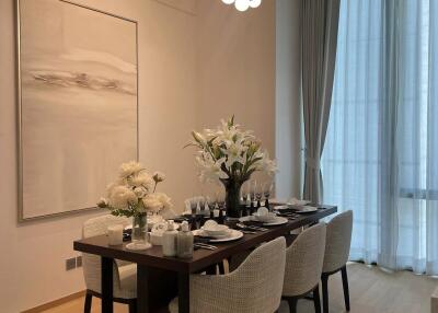 Modern dining room with a well-set table and elegant decor
