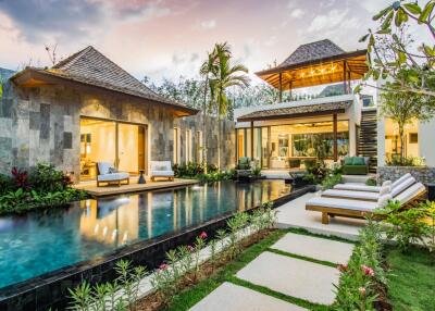 Contemporary pool villa in lush greenery