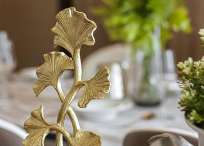 Table setting with decorative items in dining area