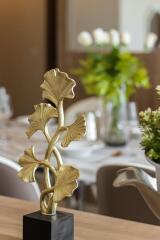 Table setting with decorative items in dining area
