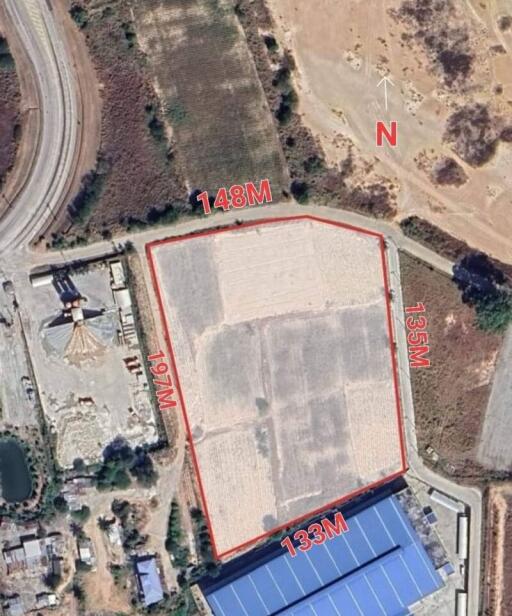 Aerial view of a plot of land with marked dimensions