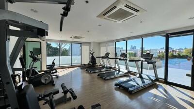 Well-lit gym with modern equipment