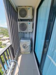 Balcony with washing machine and air conditioning units