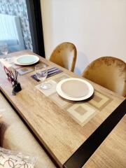 Dining table set with plates and glasses