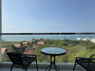 Balcony with a sea view and outdoor furniture