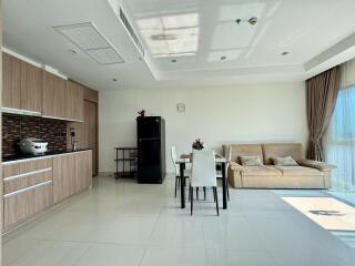 Modern open living area with kitchen and dining space