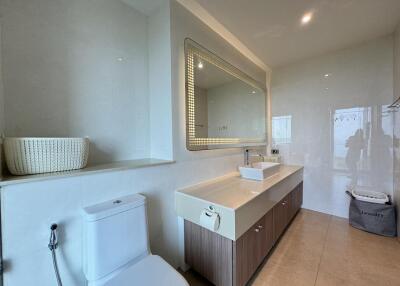 Modern bathroom with large mirror and double sink