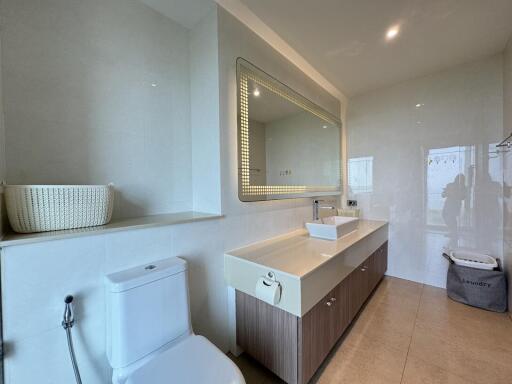 Modern bathroom with large mirror and double sink