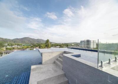 Rooftop infinity pool with scenic mountain views