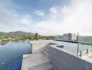 Rooftop infinity pool with scenic mountain views