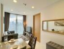 Modern living and dining area with natural light