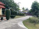 Front yard with garden and pathway leading to entrance